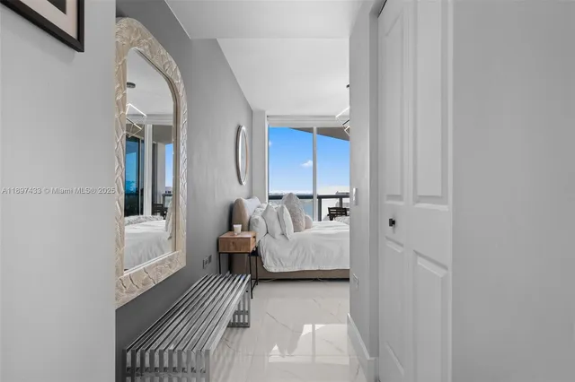 a en suite bathroom with a sink and a mirror