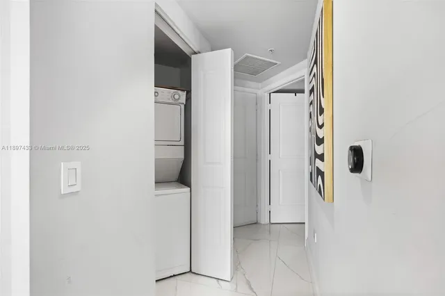 a view of a hallway with white walls