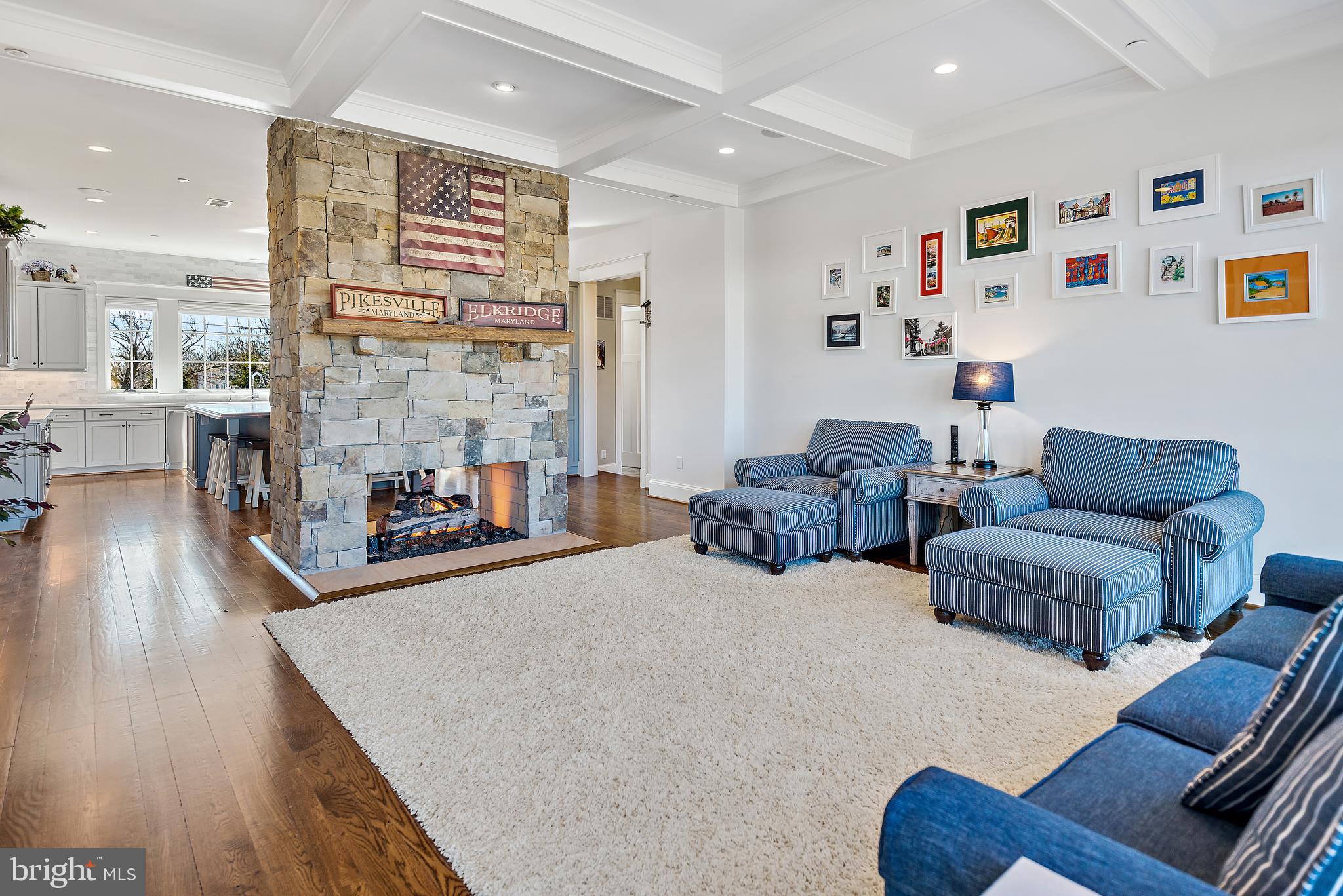 12962 Highland Road Highland, MD 20777 - Photo 21 of 74 Family Room Two-Sided Fireplace into Kitchen