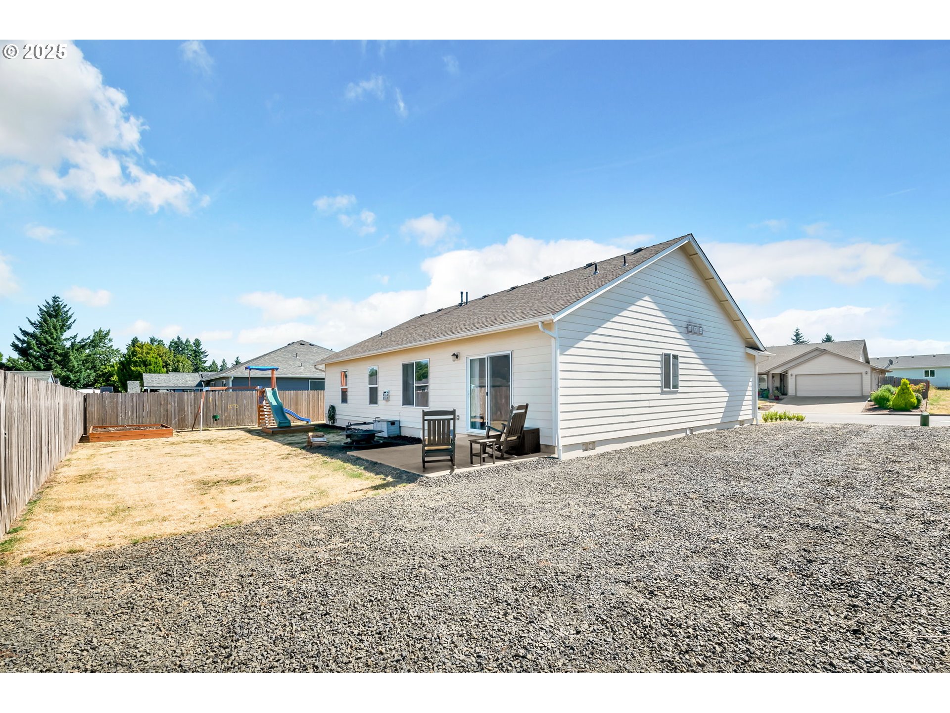525 12th Street Aumsville, OR 97325 - Photo 20 of 23 a view of a house with backyard and sitting area