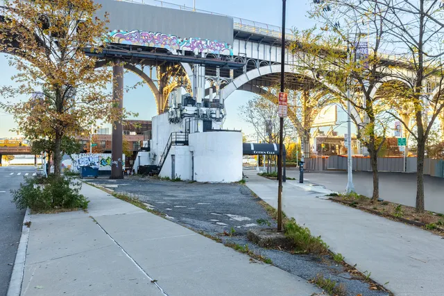a city street with tall buildings