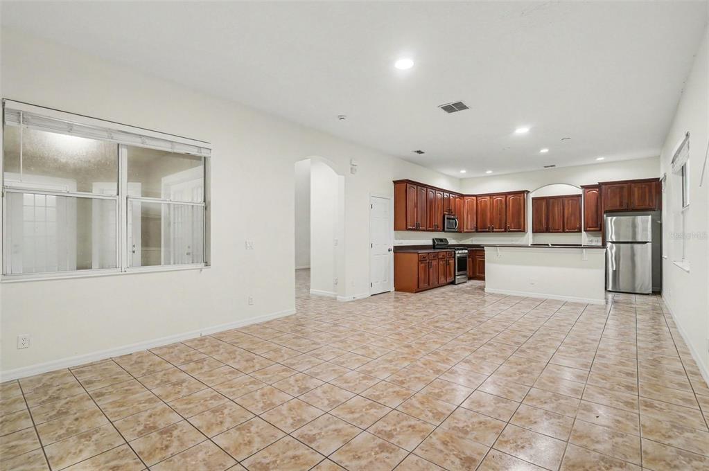 4819 Indian Deer Road Windermere, FL 34786 - Photo 8 of 30 a view of kitchen with refrigerator and cabinets