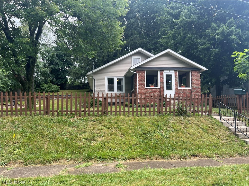 10 Brookside Boulevard Rittman, OH 44270 - Photo 1 of 40 View of front of property with a front lawn