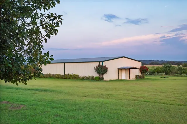 a view of a room with wooden walls