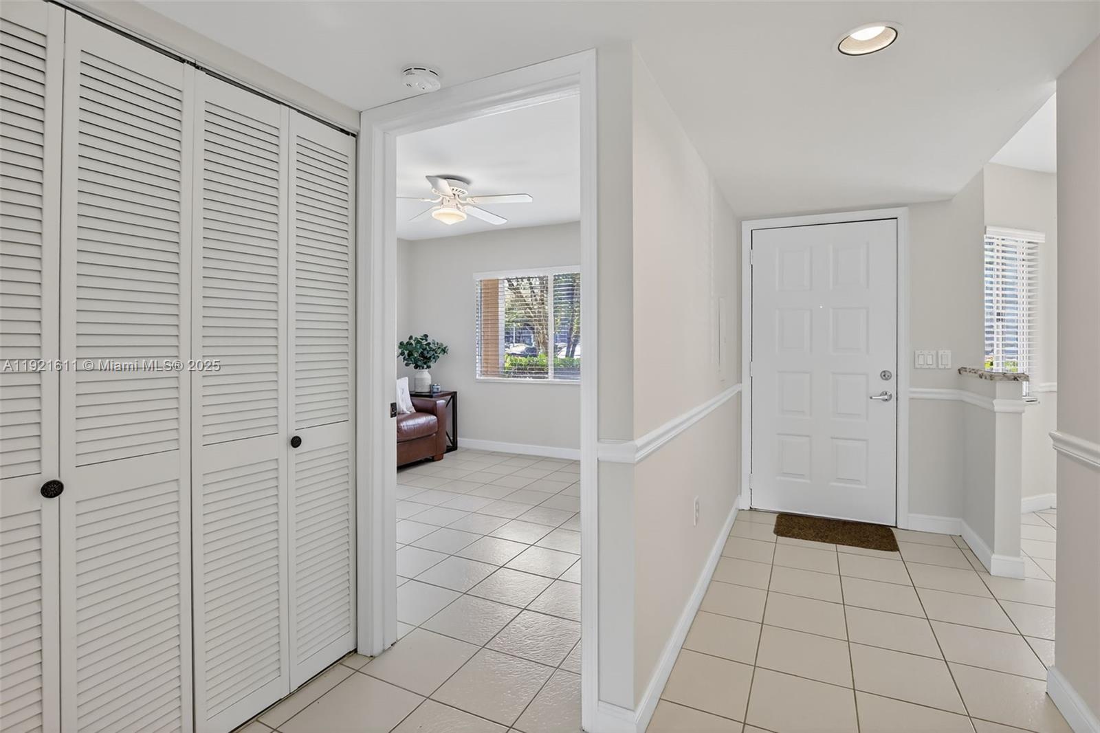 13705 Southwest 12th Street, Unit 103B Pembroke Pines, FL 33027 - Photo 26 of 59 a view of a hallway to rooms and stairs