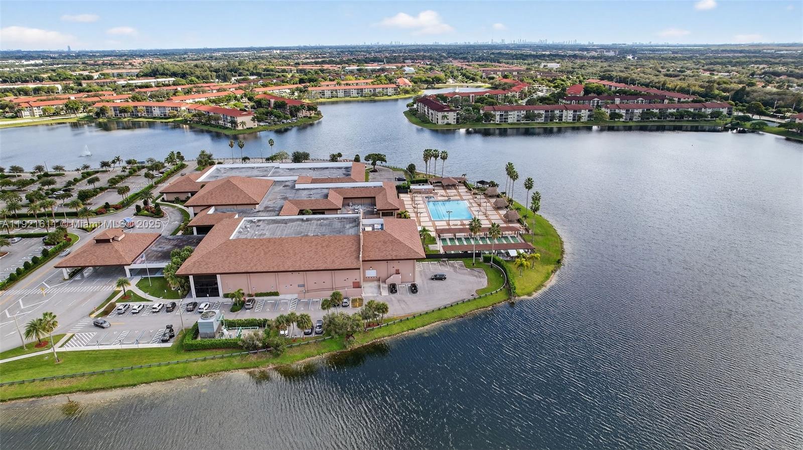 13705 Southwest 12th Street, Unit 103B Pembroke Pines, FL 33027 - Photo 41 of 59 an aerial view of a house with a lake view