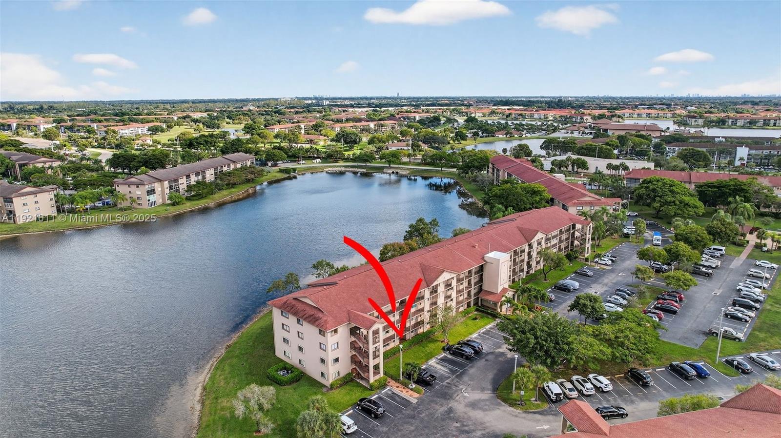13705 Southwest 12th Street, Unit 103B Pembroke Pines, FL 33027 - Photo 44 of 59 an aerial view of a house with a lake view