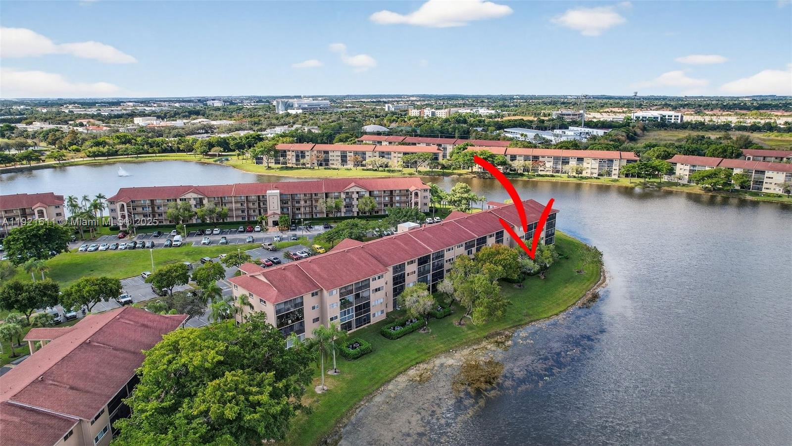 13705 Southwest 12th Street, Unit 103B Pembroke Pines, FL 33027 - Photo 47 of 59 an aerial view of a city with lake view