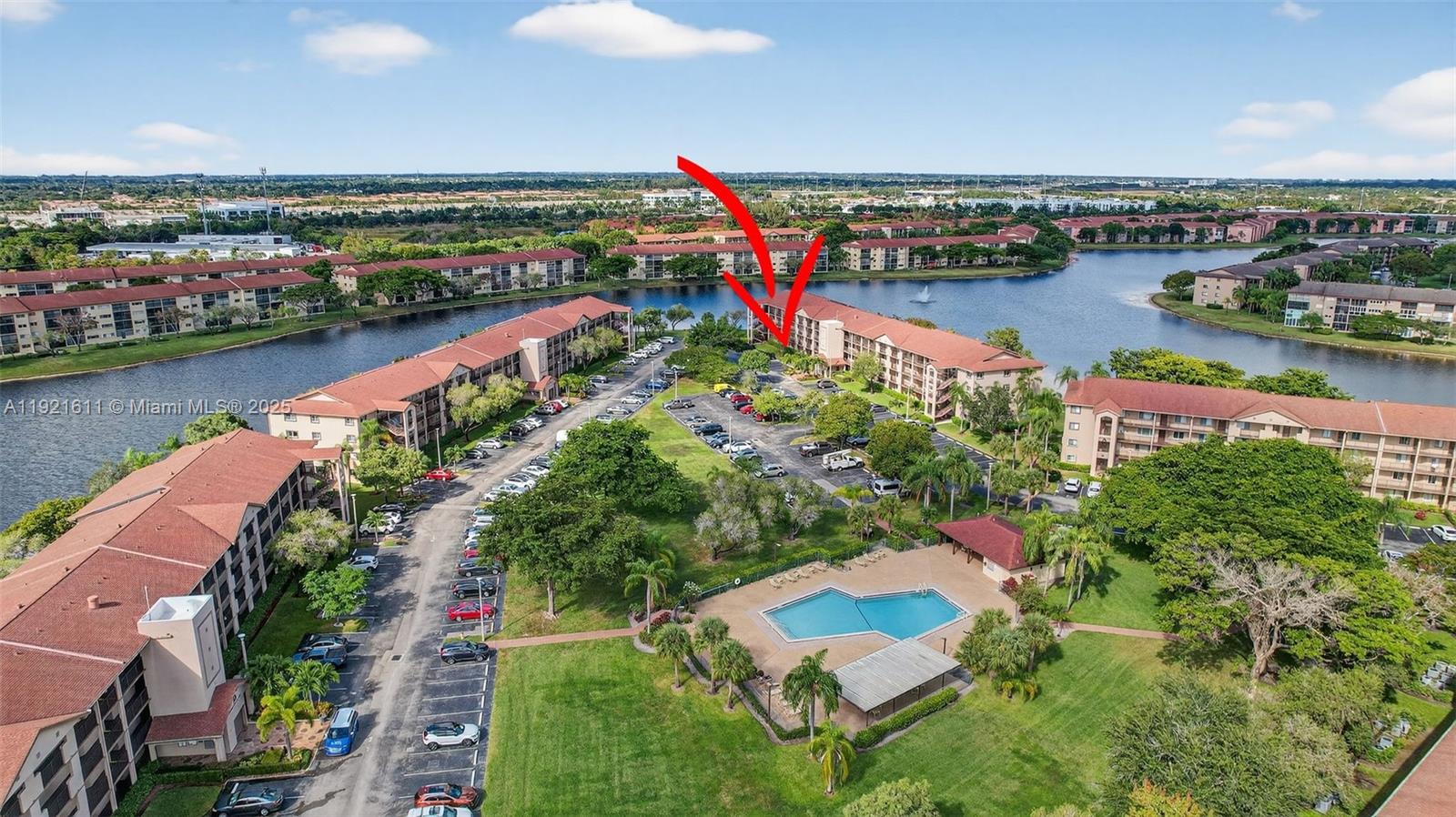 13705 Southwest 12th Street, Unit 103B Pembroke Pines, FL 33027 - Photo 48 of 59 an aerial view of a house with a lake view