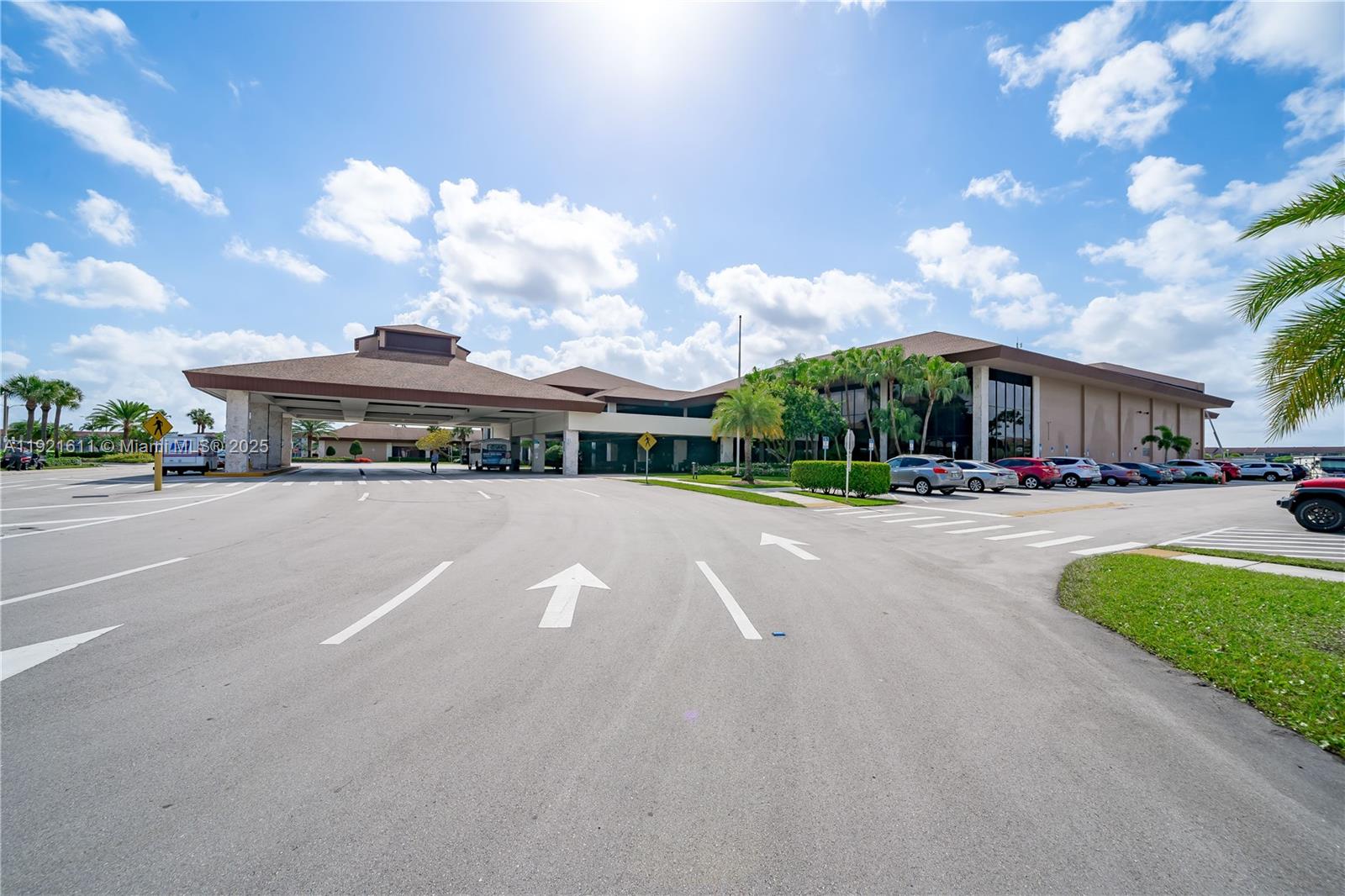 13705 Southwest 12th Street, Unit 103B Pembroke Pines, FL 33027 - Photo 52 of 59 a view of street with cars parked