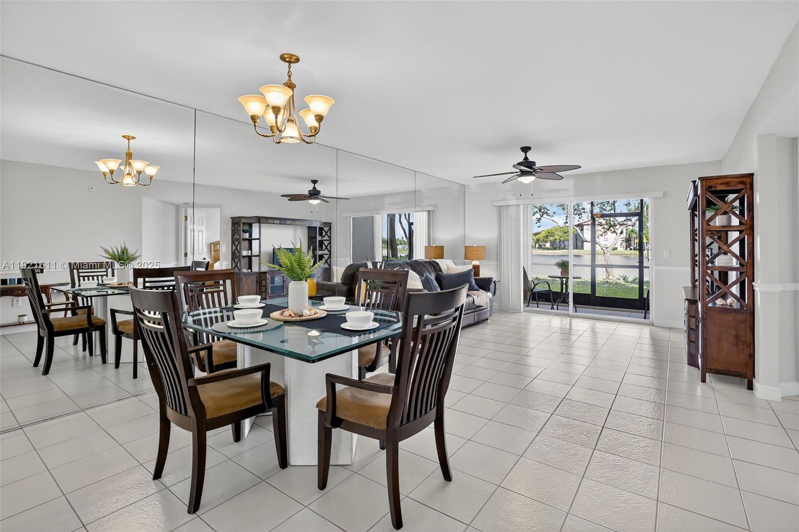 13705 Southwest 12th Street, Unit 103B Pembroke Pines, FL 33027 - Photo 9 of 59 a view of a dining room with furniture