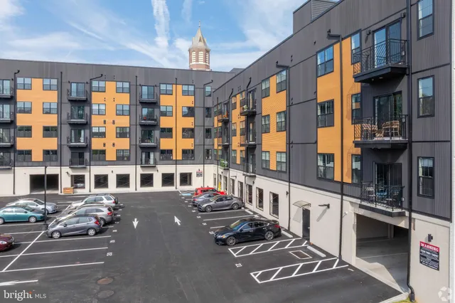a city street lined with tall buildings