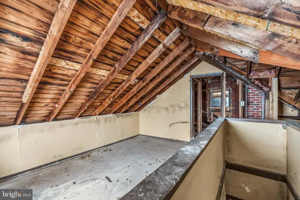 a view of a house with a small yard