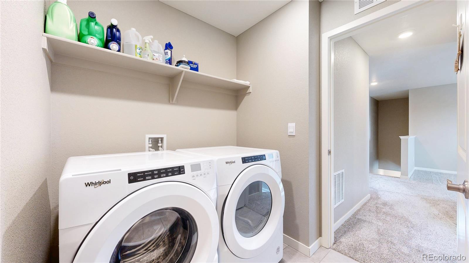 1562 Sun River Road Berthoud, CO 80513 - Photo 27 of 46 a view of washer and dryer