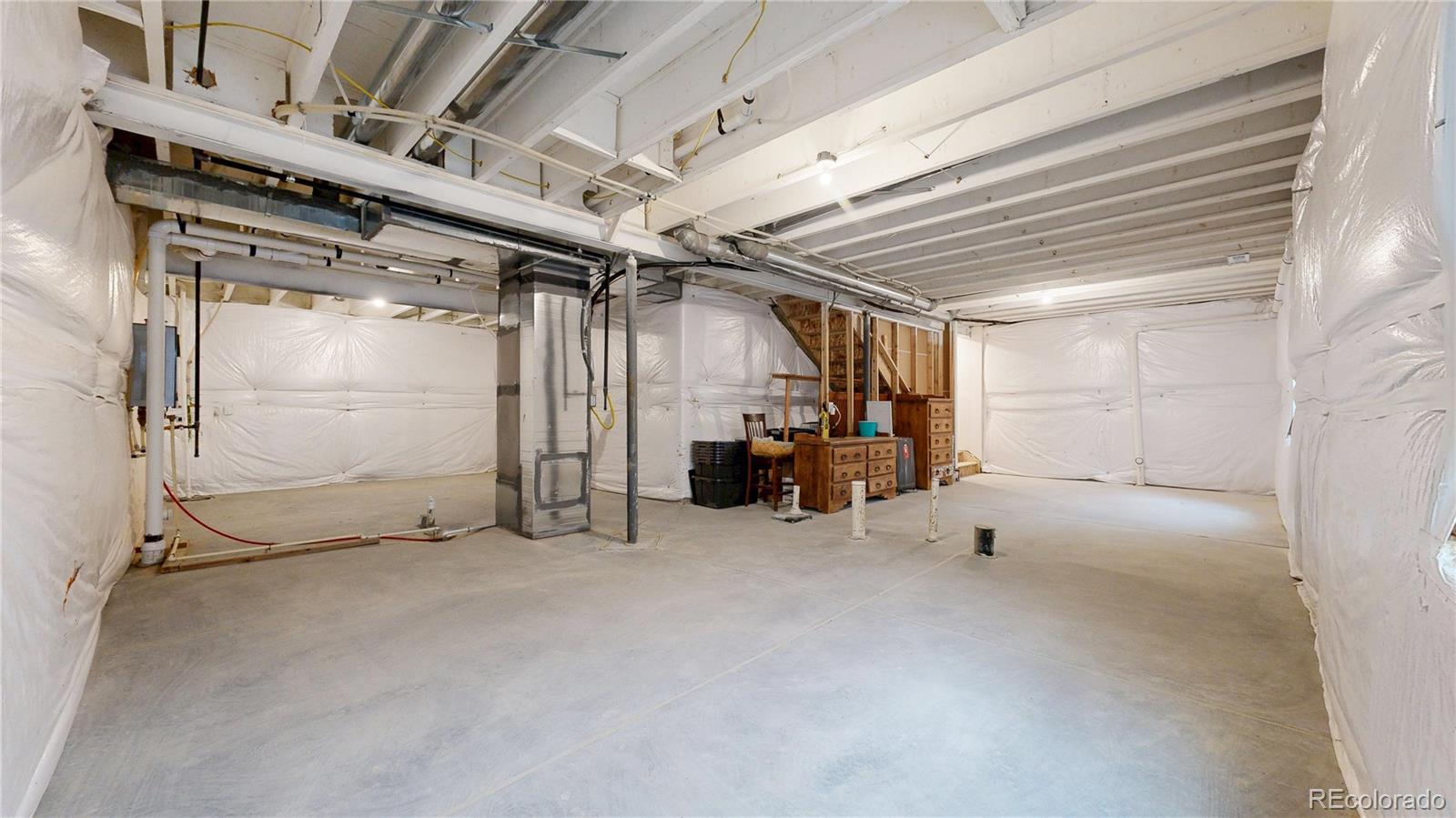 1562 Sun River Road Berthoud, CO 80513 - Photo 28 of 46 a view of a room with gym equipment