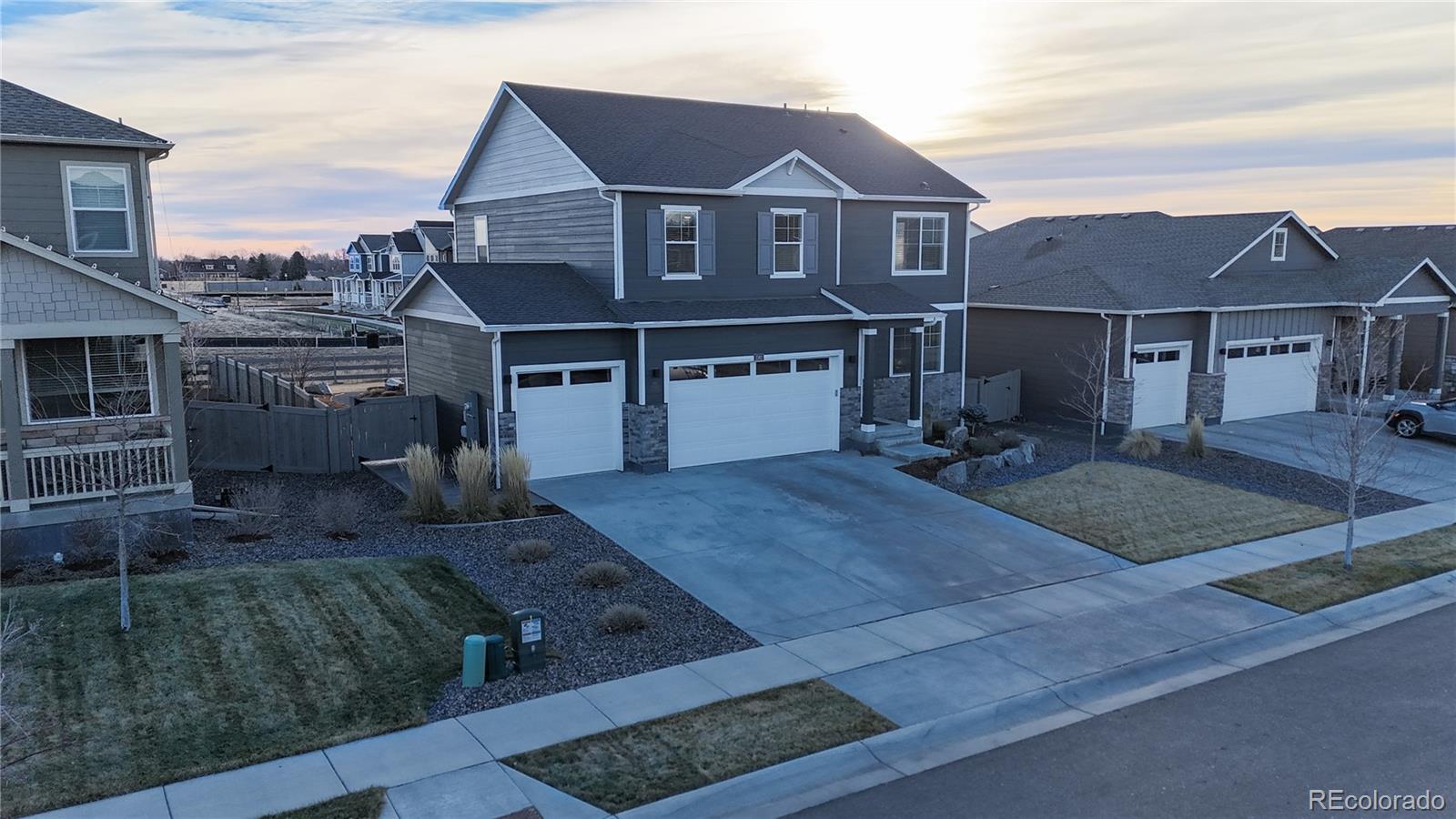 1562 Sun River Road Berthoud, CO 80513 - Photo 32 of 46 a front view of a house with garden