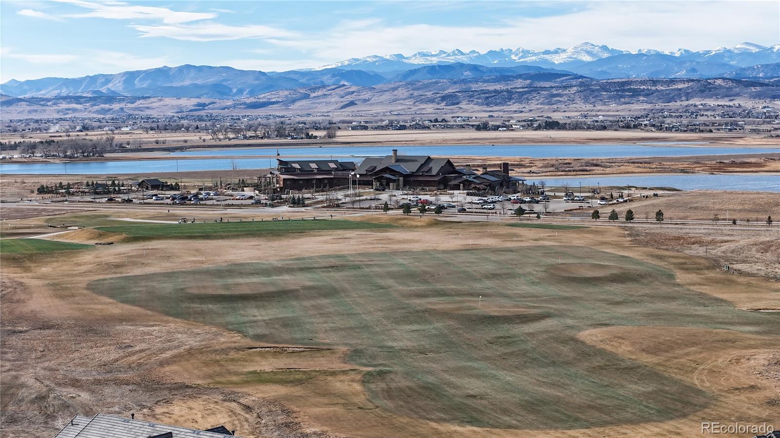 1562 Sun River Road Berthoud, CO 80513 - Photo 40 of 46 a view of a lake with a mountain