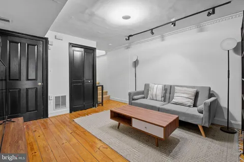 a bedroom with a bed and a walk in closet