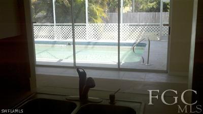 17449 Fuchsia Road Fort Myers, FL 33967 - Photo 3 of 4 a bathroom with a window