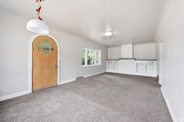 262 West 400 South Springville, UT 84663 - Photo 9 of 17 Spacious room with gray carpet flooring and light gray walls