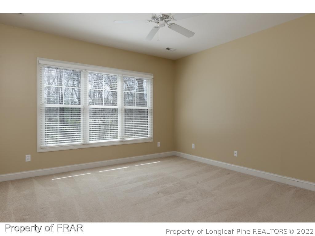 18 Elk Ridge Lane Southern Pines, NC 28387 - Photo 12 of 21 a view of an empty room with a window