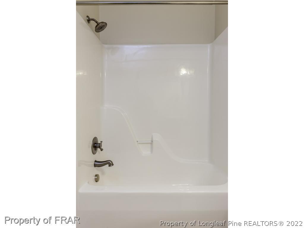 18 Elk Ridge Lane Southern Pines, NC 28387 - Photo 18 of 21 a bathroom with a bathtub