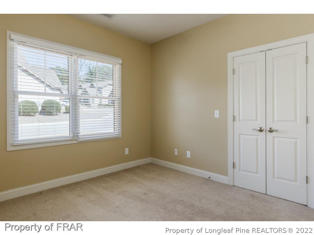 18 Elk Ridge Lane Southern Pines, NC 28387 - Photo 8 of 21 a view of an empty room with a window