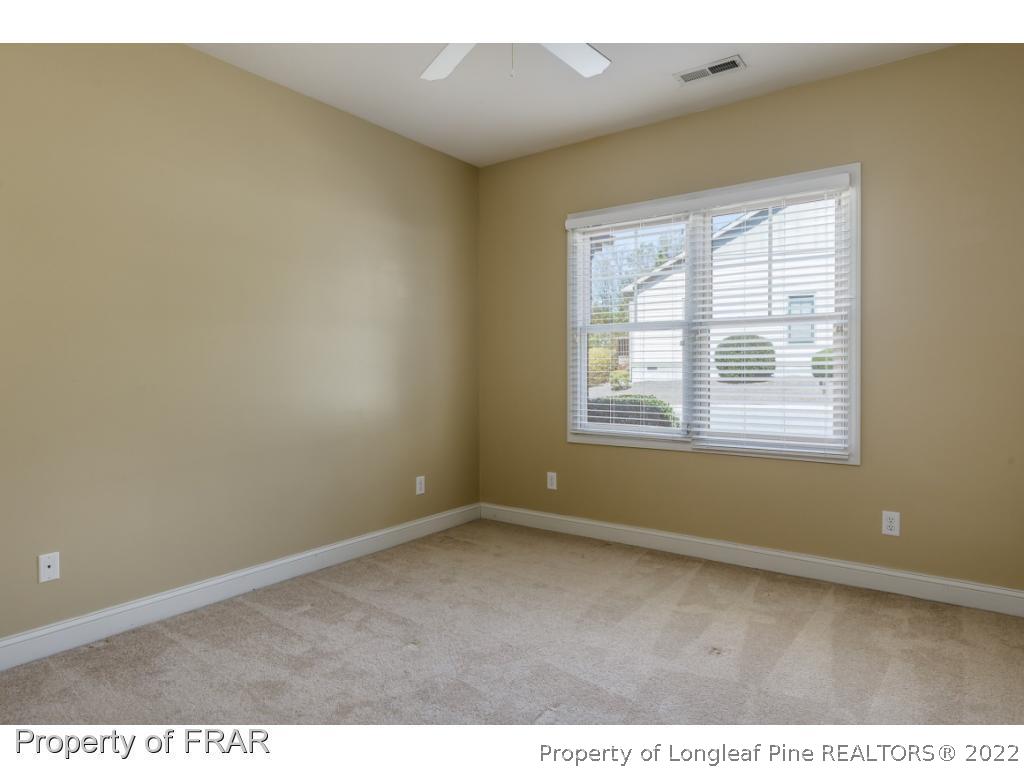 18 Elk Ridge Lane Southern Pines, NC 28387 - Photo 9 of 21 a view of an empty room with a window