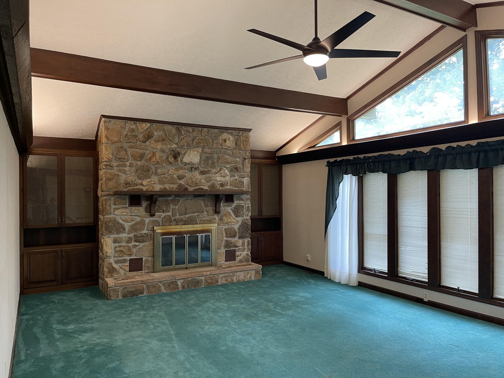 1616 Golf Course Road Newport, TN 37821 - Photo 13 of 38 a living room with furniture and a fireplace