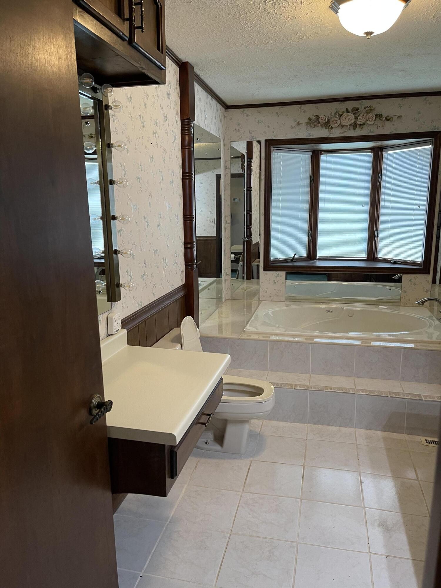 1616 Golf Course Road Newport, TN 37821 - Photo 18 of 38 a bathroom with a sink and a mirror