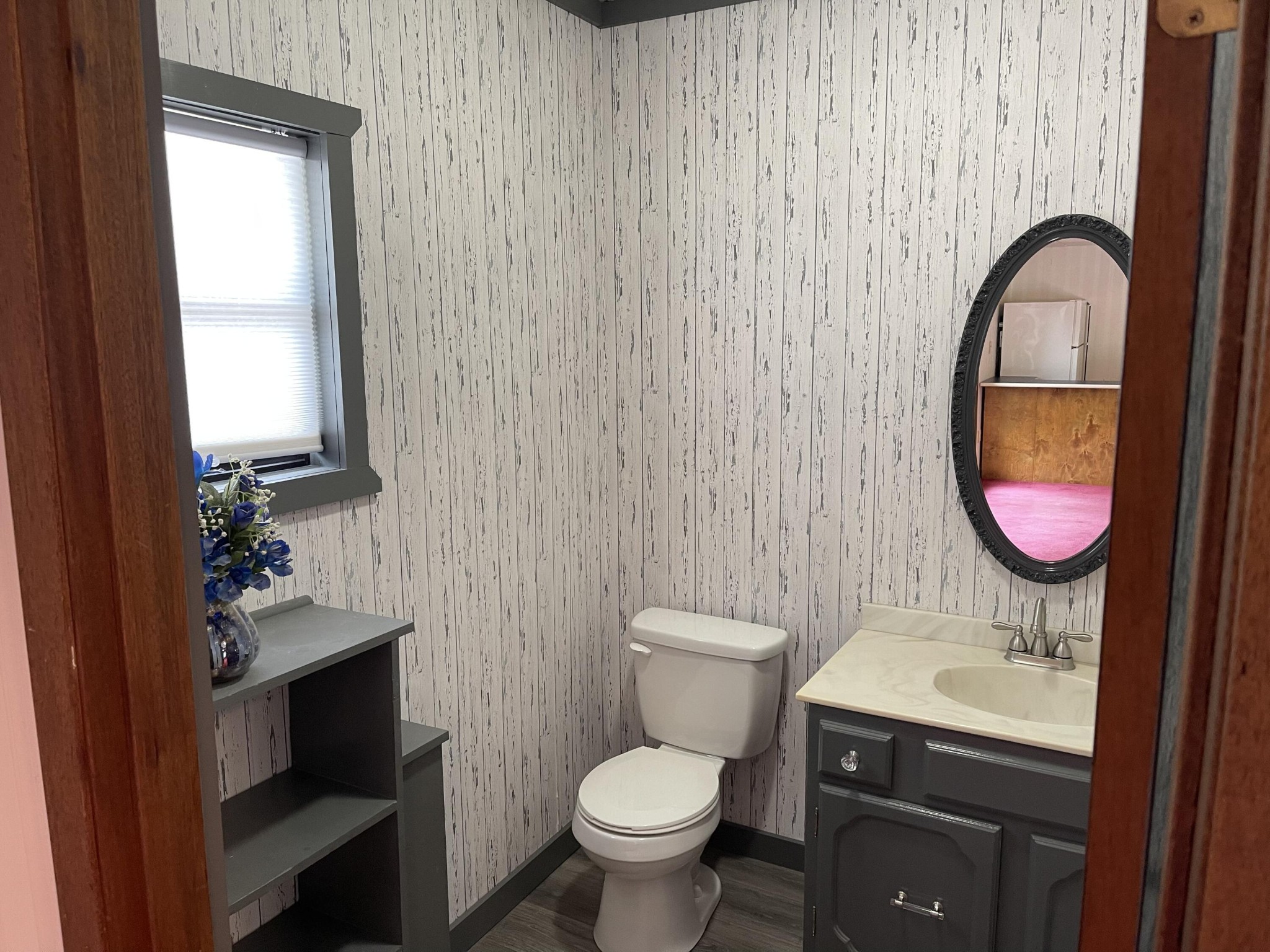 1616 Golf Course Road Newport, TN 37821 - Photo 8 of 38 a bathroom with a sink a toilet and a mirror