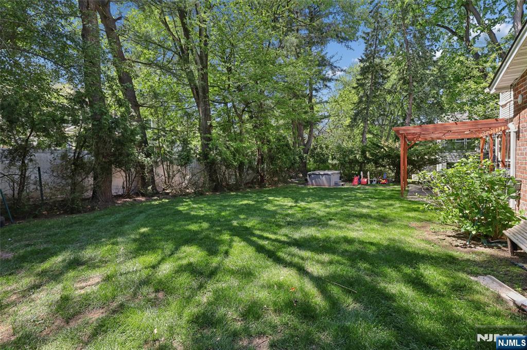 604 Rutland Avenue Teaneck, NJ 07666 - Photo 28 of 31 a green field with lots of trees