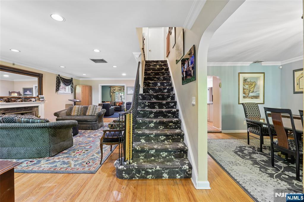 604 Rutland Avenue Teaneck, NJ 07666 - Photo 3 of 31 a living room with furniture and a wooden floor