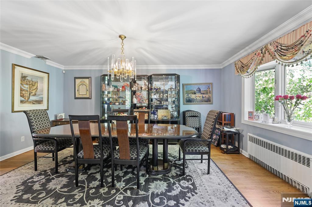 604 Rutland Avenue Teaneck, NJ 07666 - Photo 5 of 31 a view of a dining room with furniture window and outside view