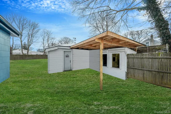 a backyard of a house with lots of green space