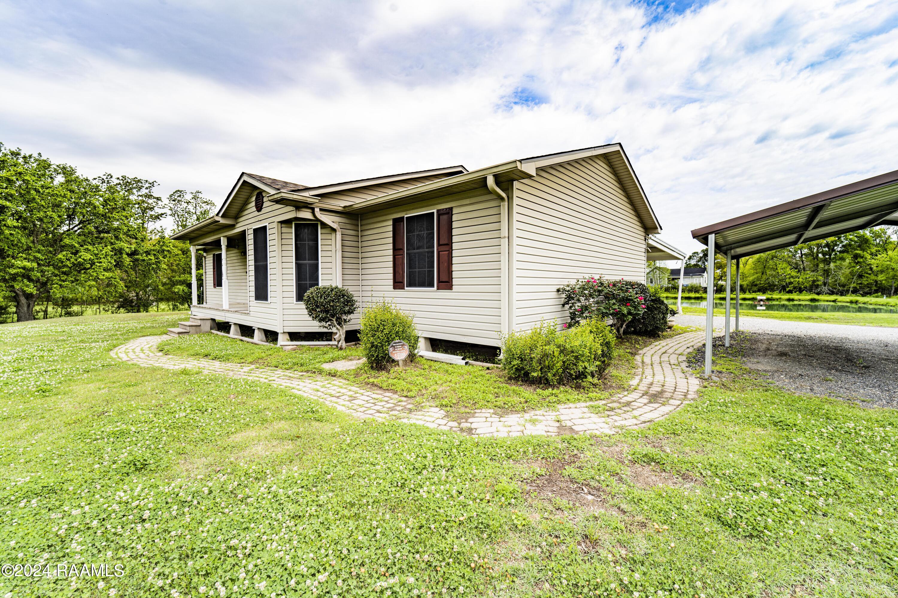 916 Sharon Drive Youngsville, LA 70592 - Photo 3 of 37 Front3