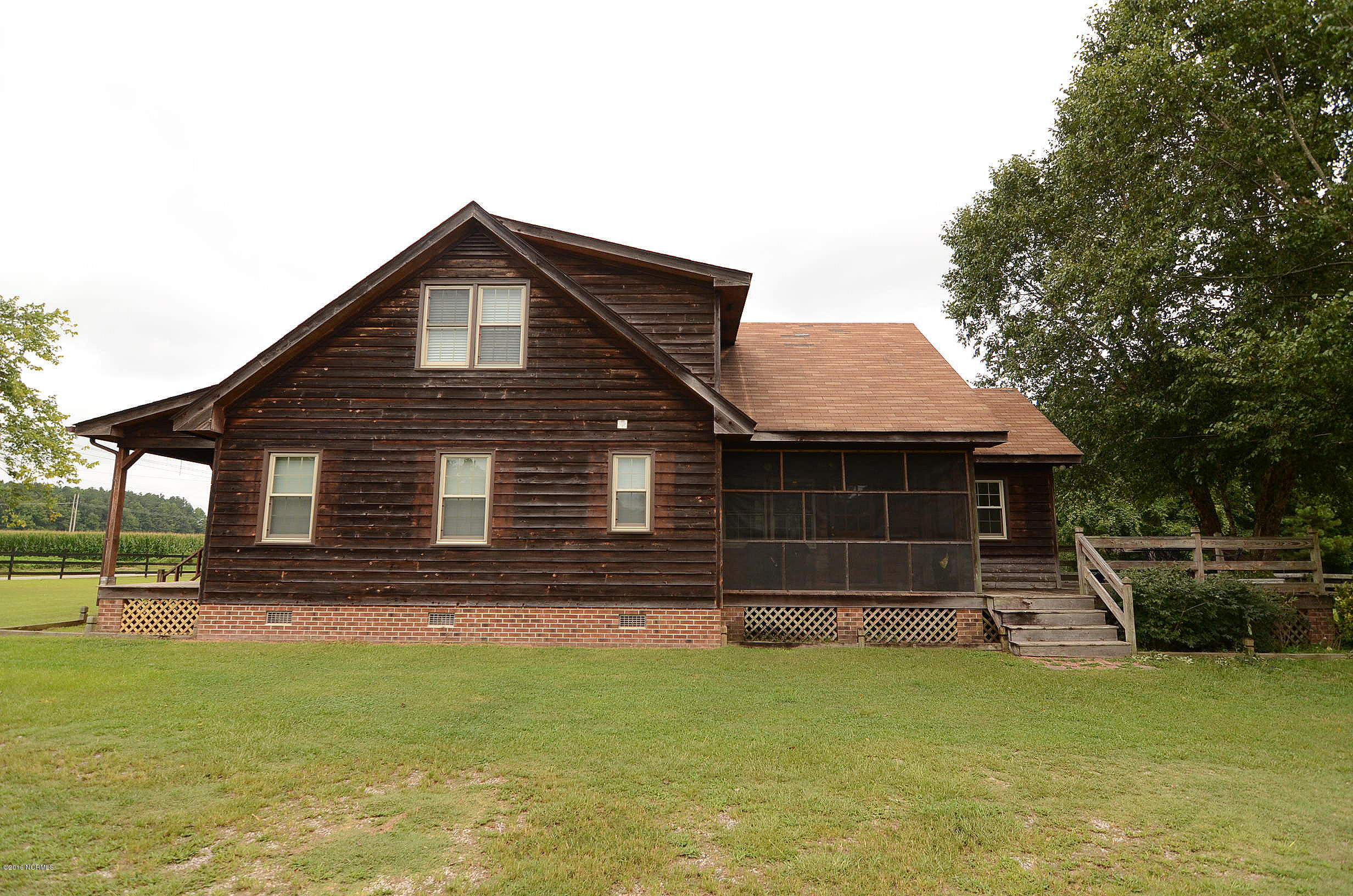 5759 Glory Road Wilson, NC 27893 - Photo 12 of 16 Screened Porch and Attached Deck