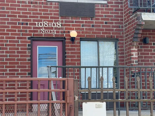 a front view of a building with glass windows