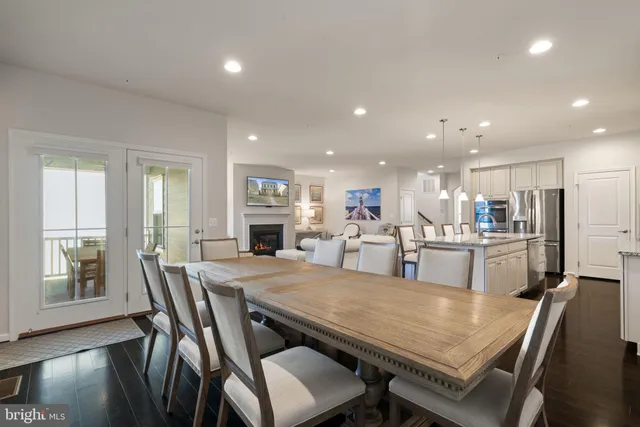 a bedroom with bed and painting on the wall