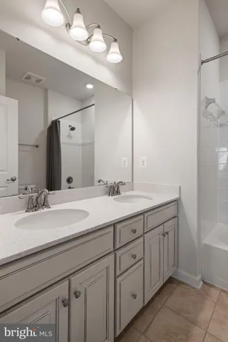 a kitchen with stainless steel appliances granite countertop a sink and stove