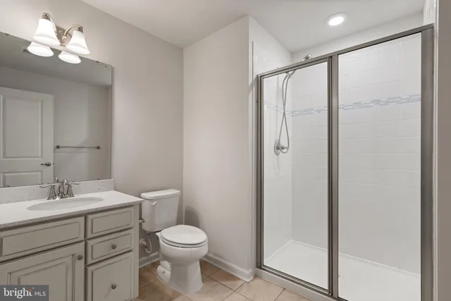 a living room with fireplace furniture and a flat screen tv