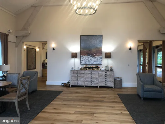 a sign on the side of the tree