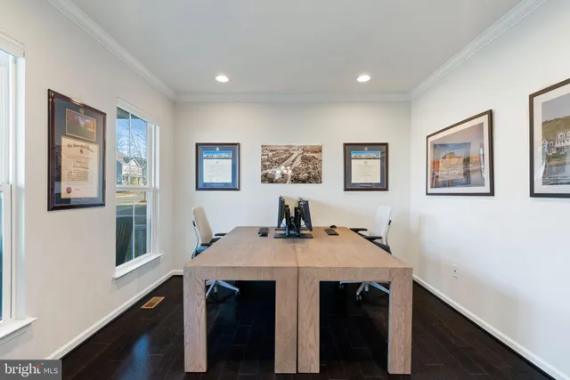 a bathroom with a sink a mirror and a vanity