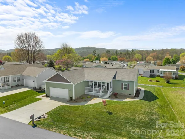 an aerial view of a house with a garden view