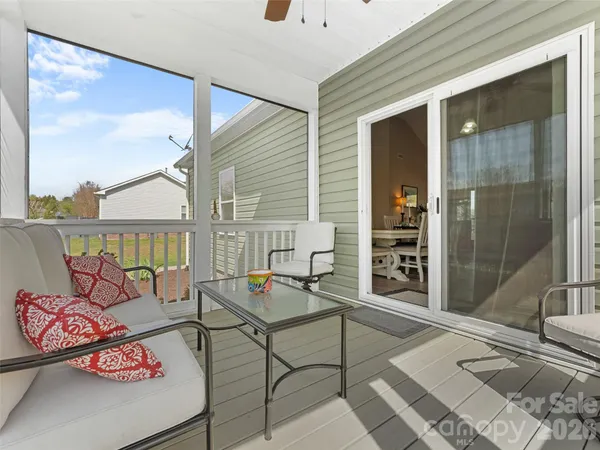a outdoor space with patio the couches and a potted plant