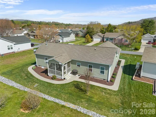 a aerial view of a house with a big yard