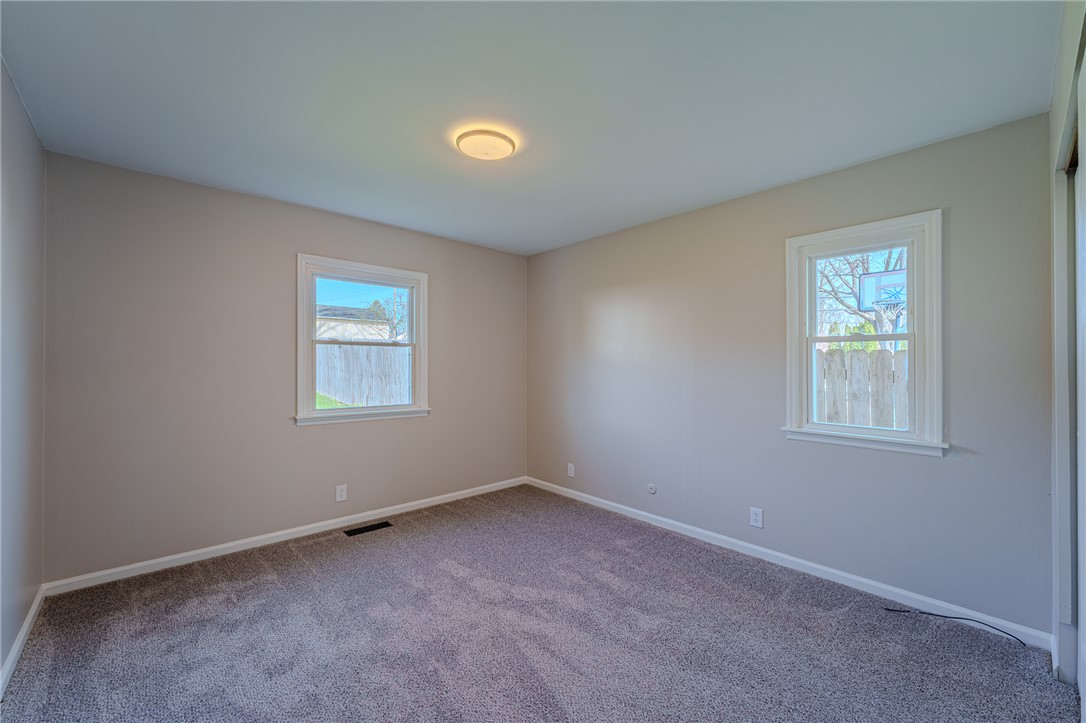 1005 Burt Street Springfield, OH 45505 - Photo 20 of 33 This bright bedroom offers a neutral palette and plush carpeting, ready for personalization.