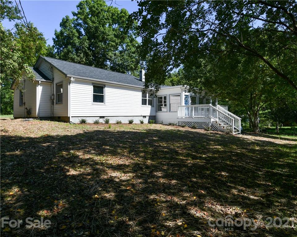 1215 Summerville Road Charlotte, NC 28214 - Photo 2 of 25 a house view with a outdoor space