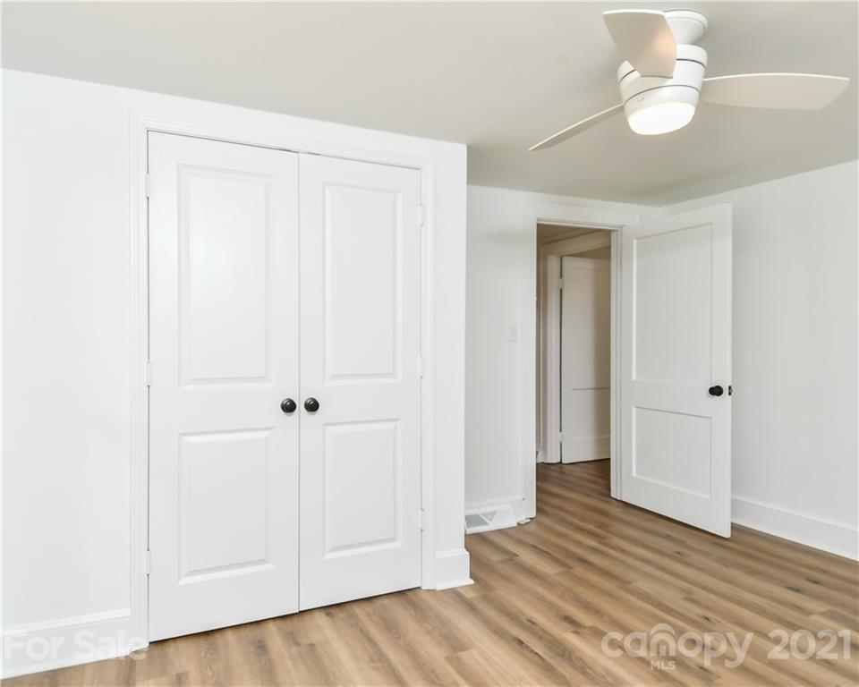 1215 Summerville Road Charlotte, NC 28214 - Photo 14 of 25 wooden floor in an empty room