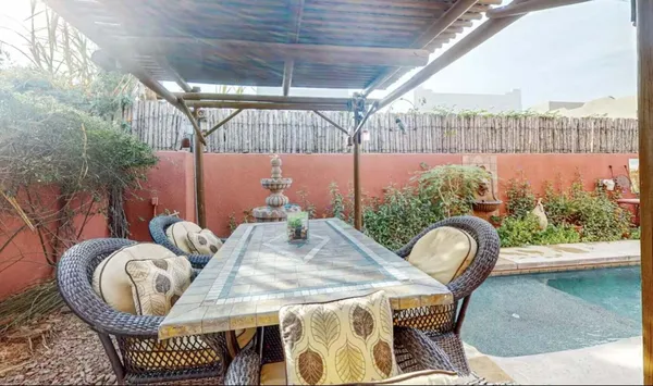 a outdoor living space with furniture and a potted plant